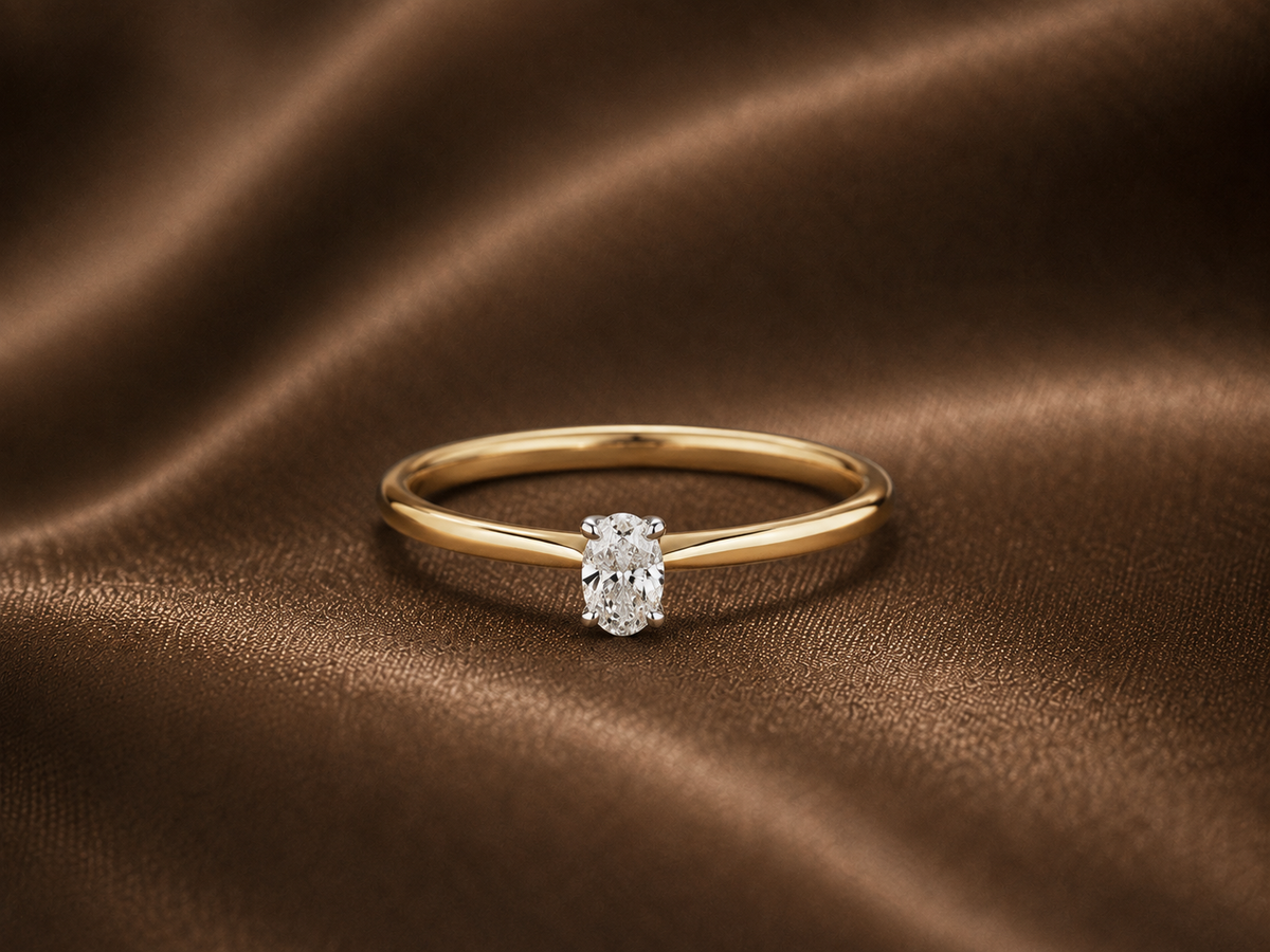 The Whisper Petite Oval Solitaire Ring