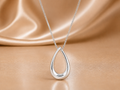 The Luminous Silhouette Drop Necklace