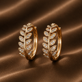 The Golden Vine Huggie Hoops