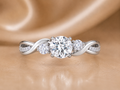 Brilliant Round Three-Stone Infinity Ring