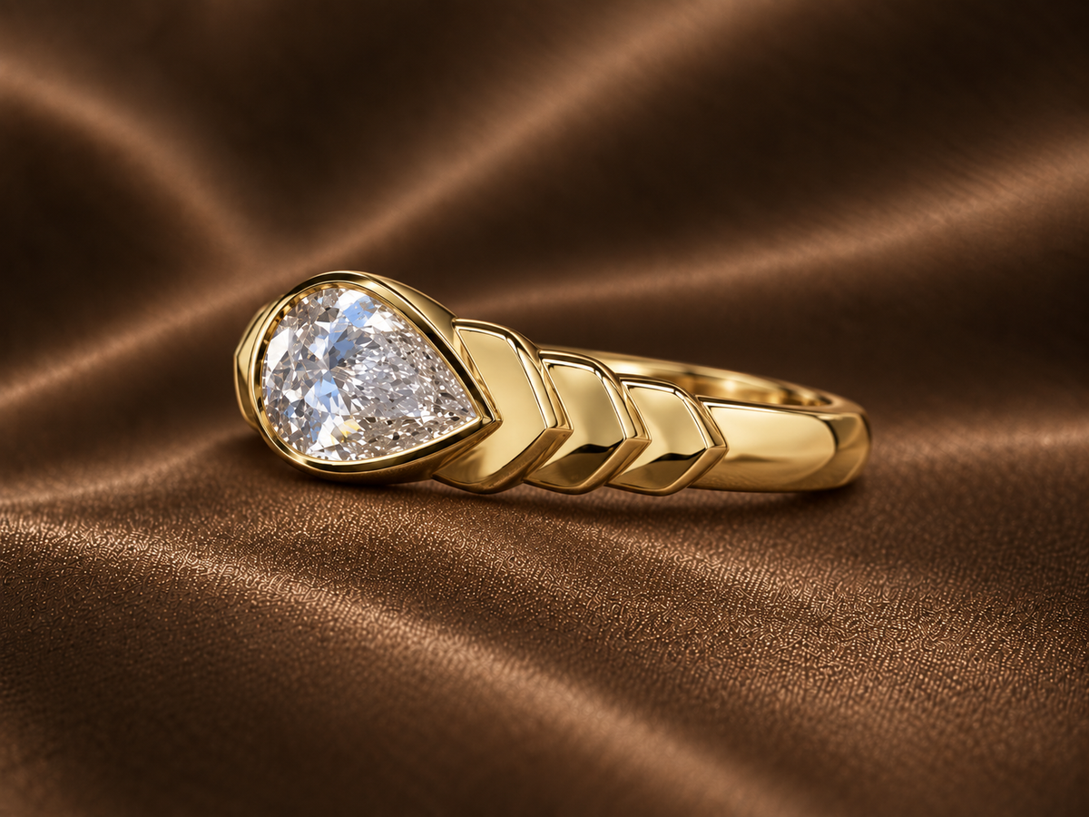 The Chevron Pear Bezel Ring